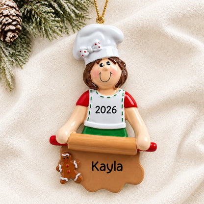 Personalized baking christmas ornament laid on a soft white knit blanket