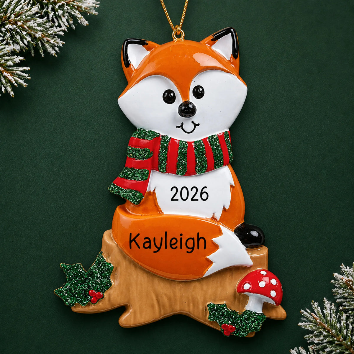 Personalized fox christmas ornament on a dark green pine background