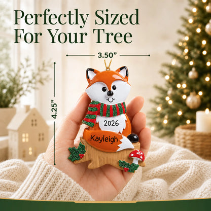 Size guide: the personalized fox christmas ornament is 3.50 in wide by 4.25 in tall, shown in hand