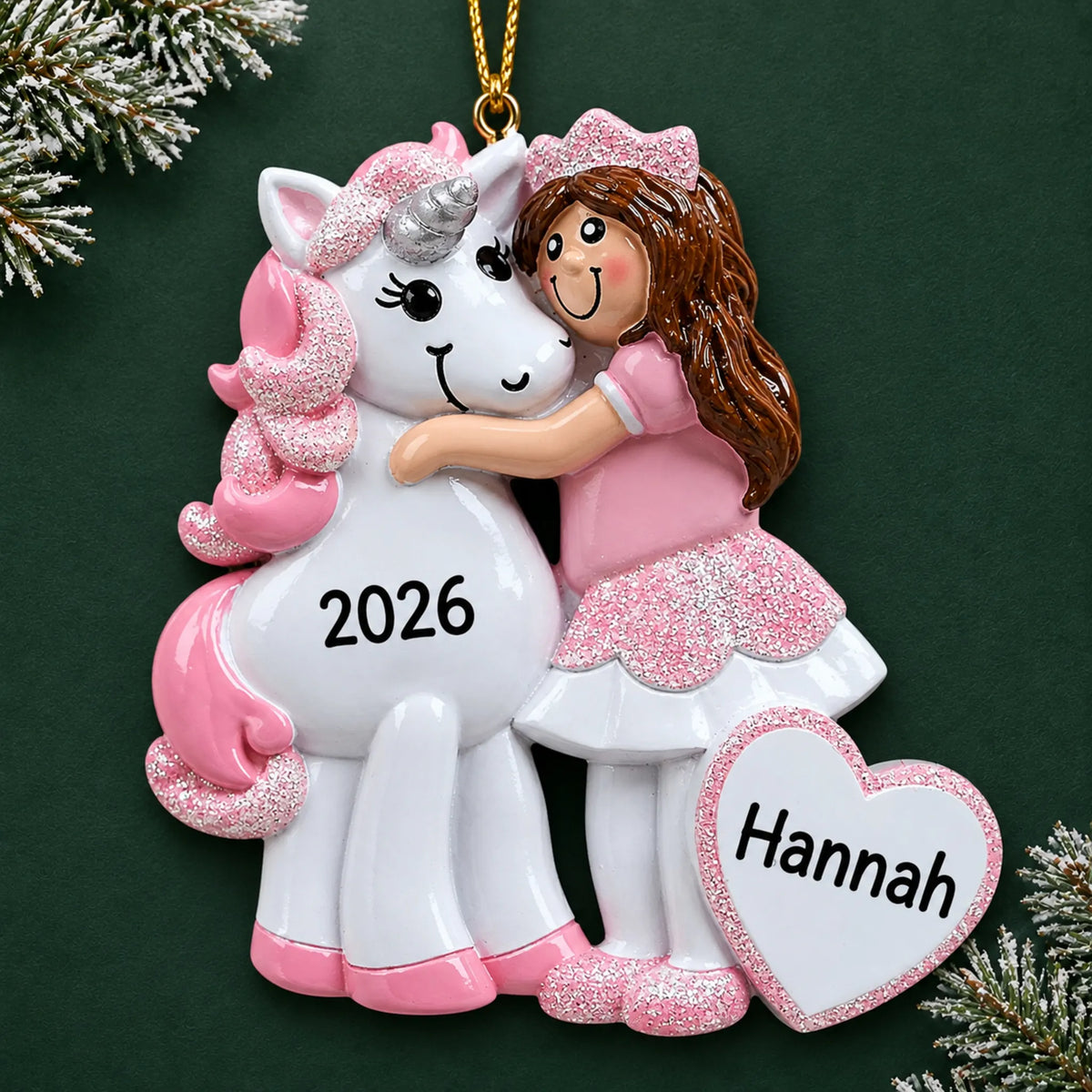Personalized princess & unicorn christmas ornament on a dark green pine background