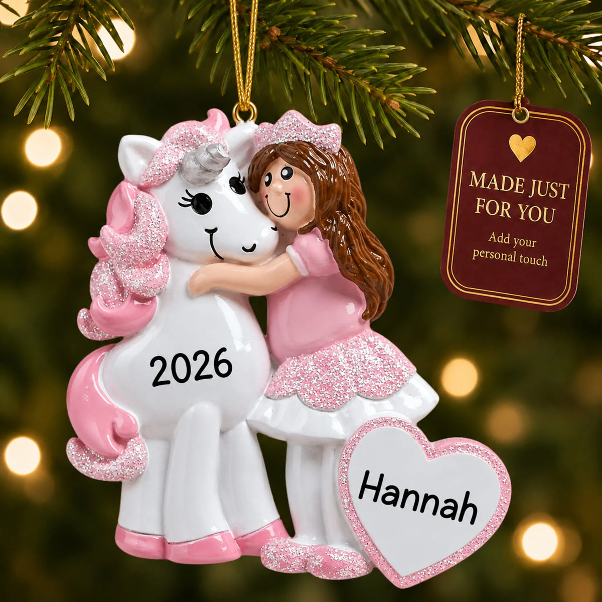 Princess & unicorn christmas ornament hanging on a lit Christmas tree with a Made Just For You gift tag