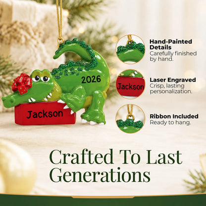 Hand-painted details and laser engraved personalization on the alligator christmas ornament, ribbon included