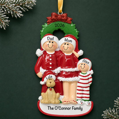 Personalized family of 3 with dog christmas ornament on a dark green pine background