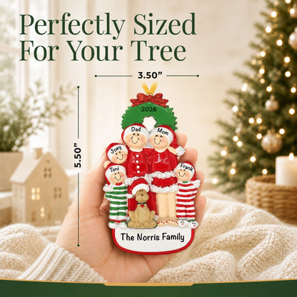 Hand holding family of 5 with dog ornament, 5.5 by 3.5 inches, perfectly sized for your tree