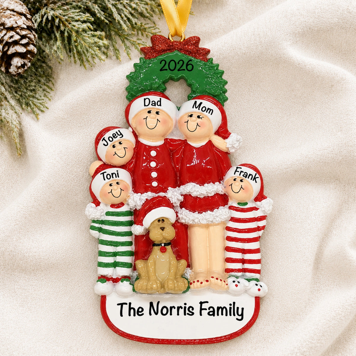 Personalized family of 5 with dog Christmas ornament with names on a soft blanket