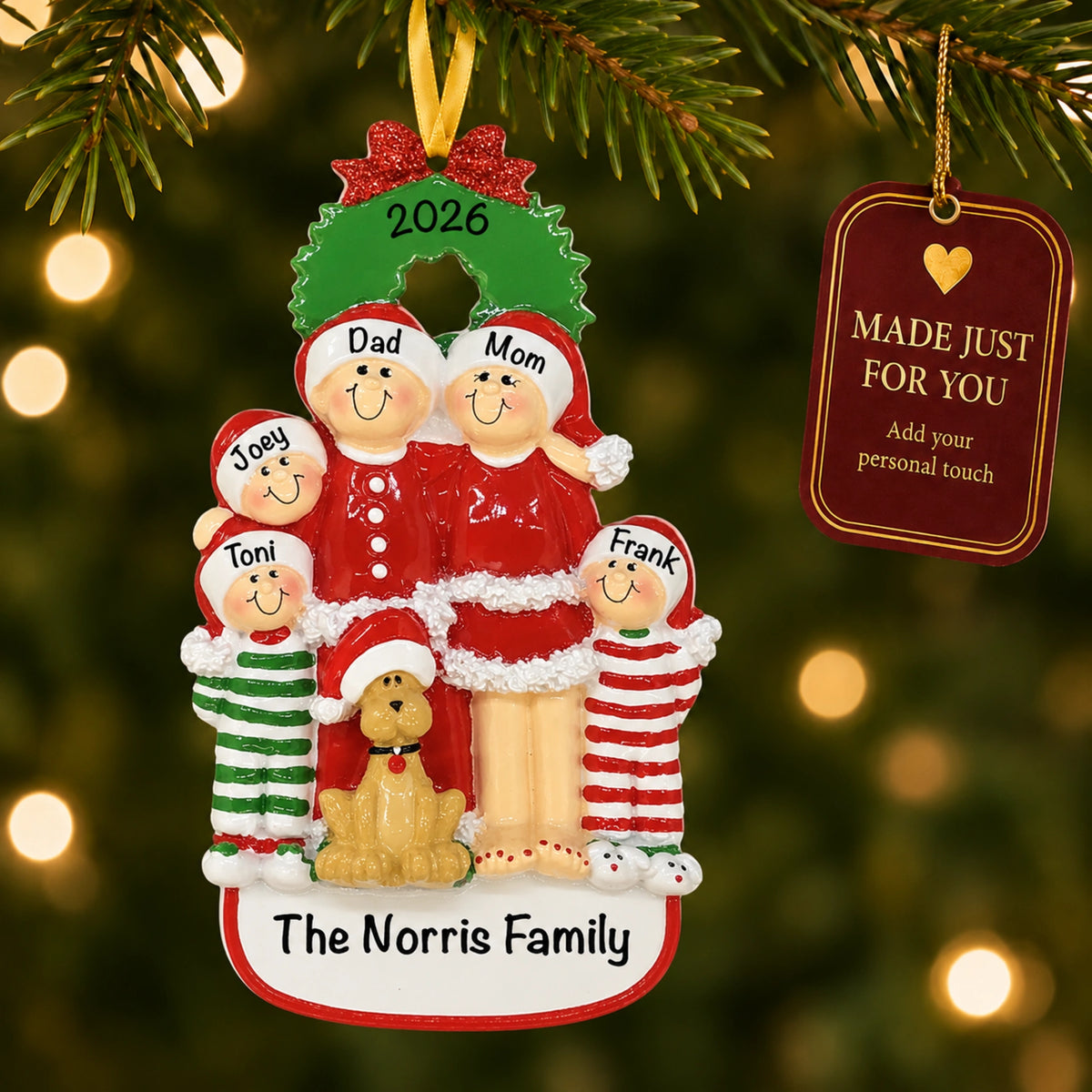 Personalized family of 5 with dog ornament hanging on a tree with Made Just For You tag
