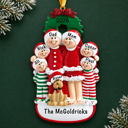 Personalized family of 6 with dog christmas ornament on a dark green pine background