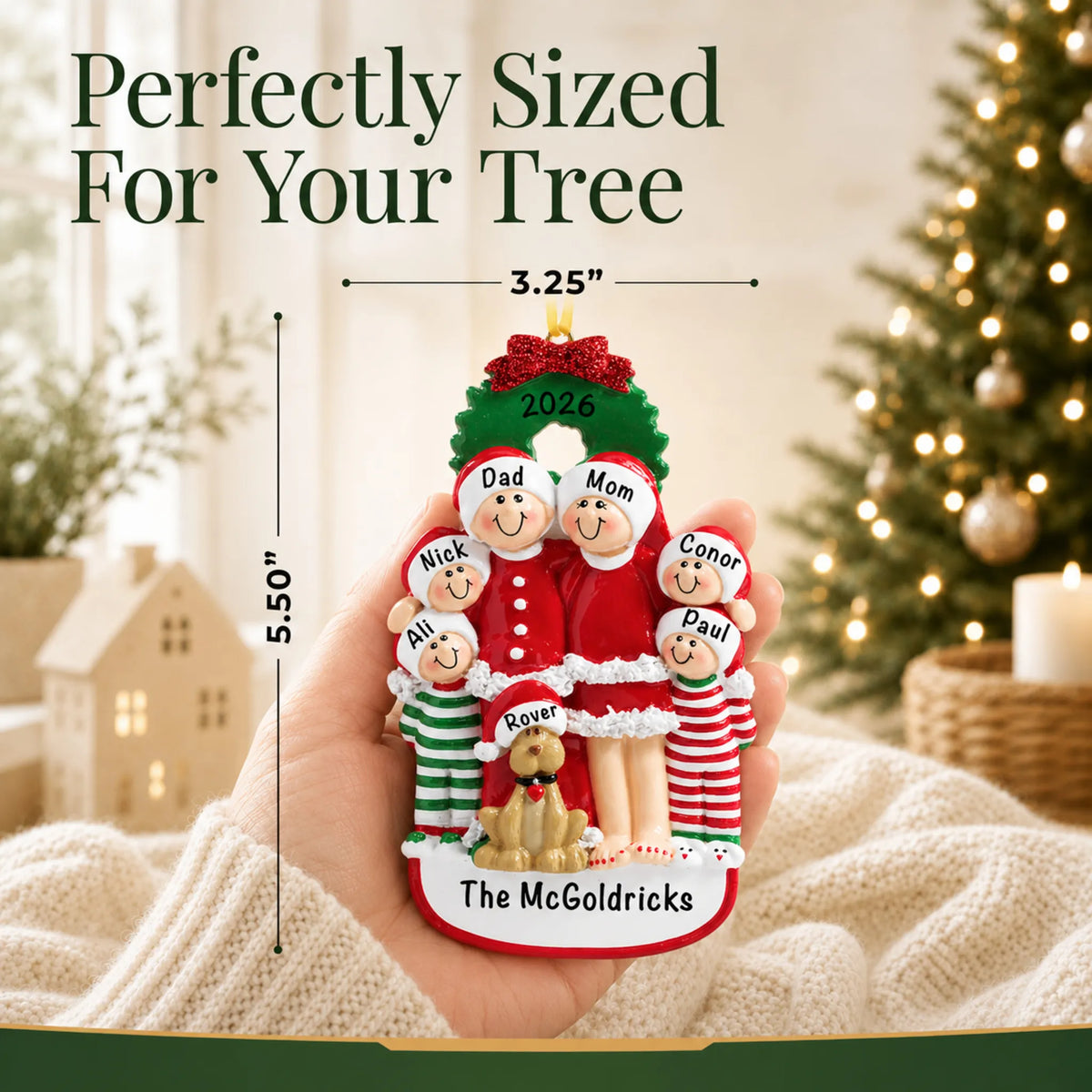 Size guide: the personalized family of 6 with dog christmas ornament is 3.25 in wide by 5.50 in tall, shown in hand