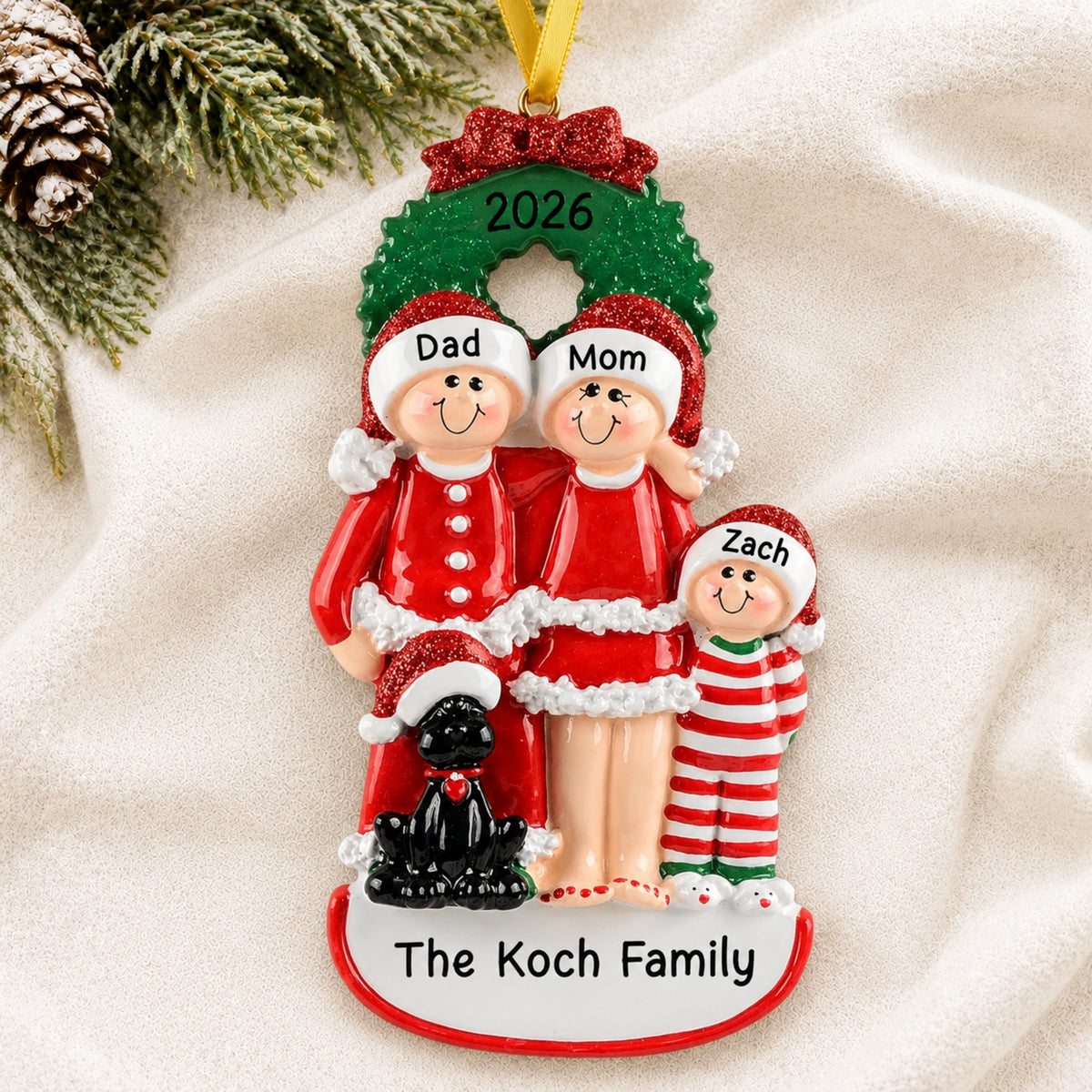 Personalized family of 3 with black dog Christmas ornament with names on a soft blanket