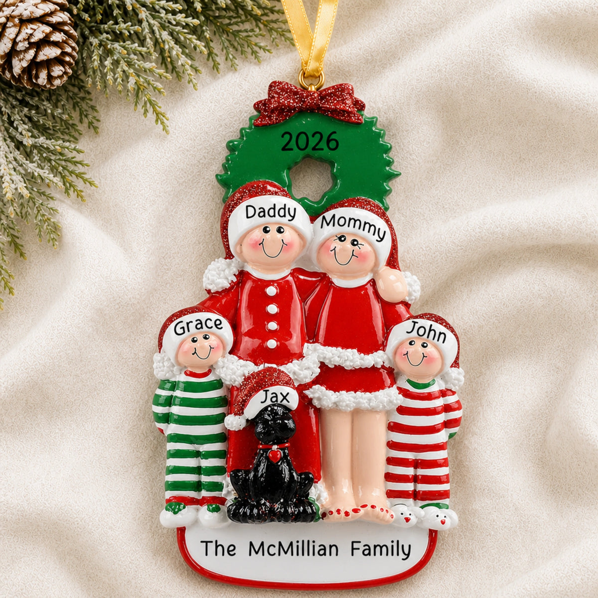 Personalized family of 4 with black dog christmas ornament with names on a snowy white background