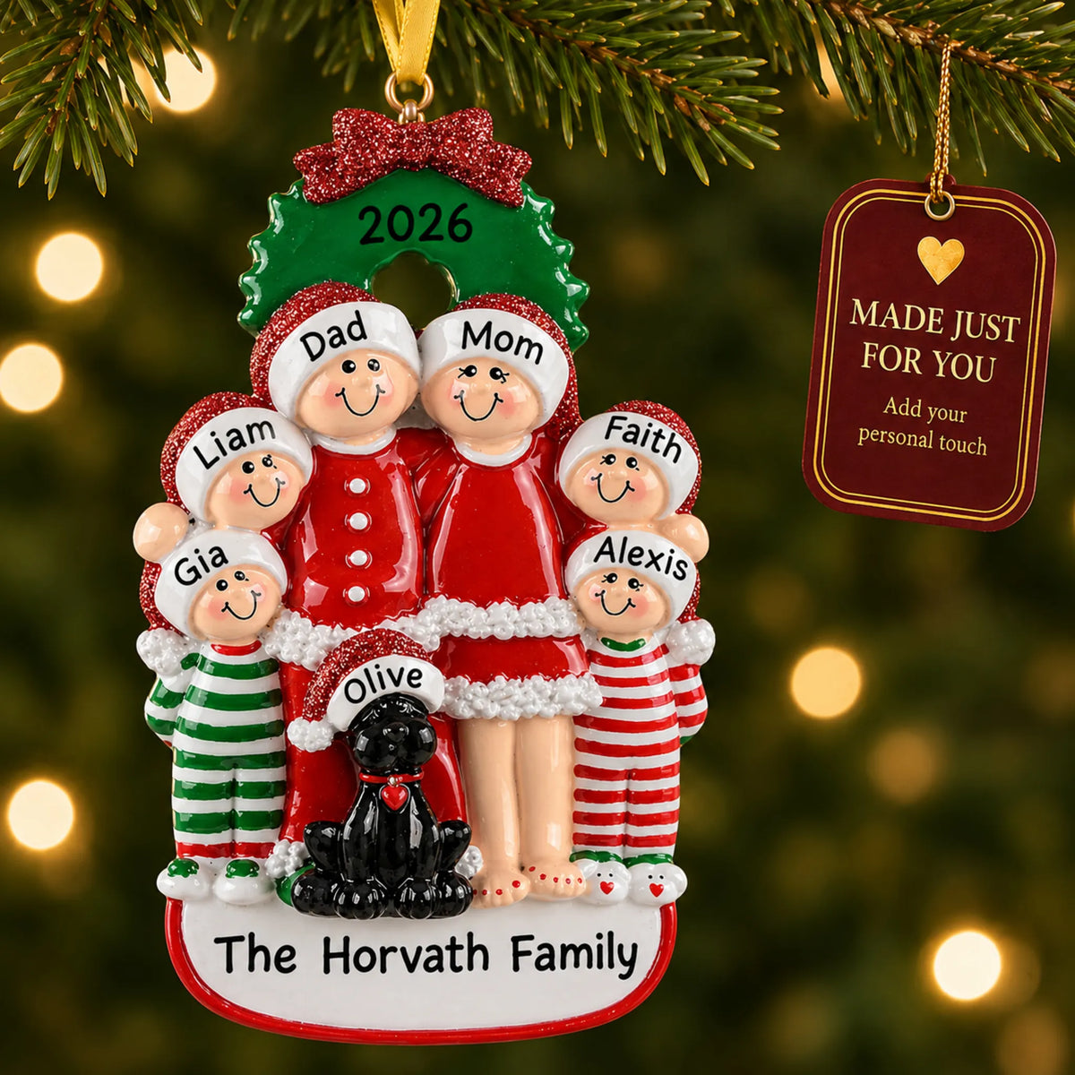 Family of 6 with black dog christmas ornament hanging on a lit Christmas tree with a Made Just For You gift tag