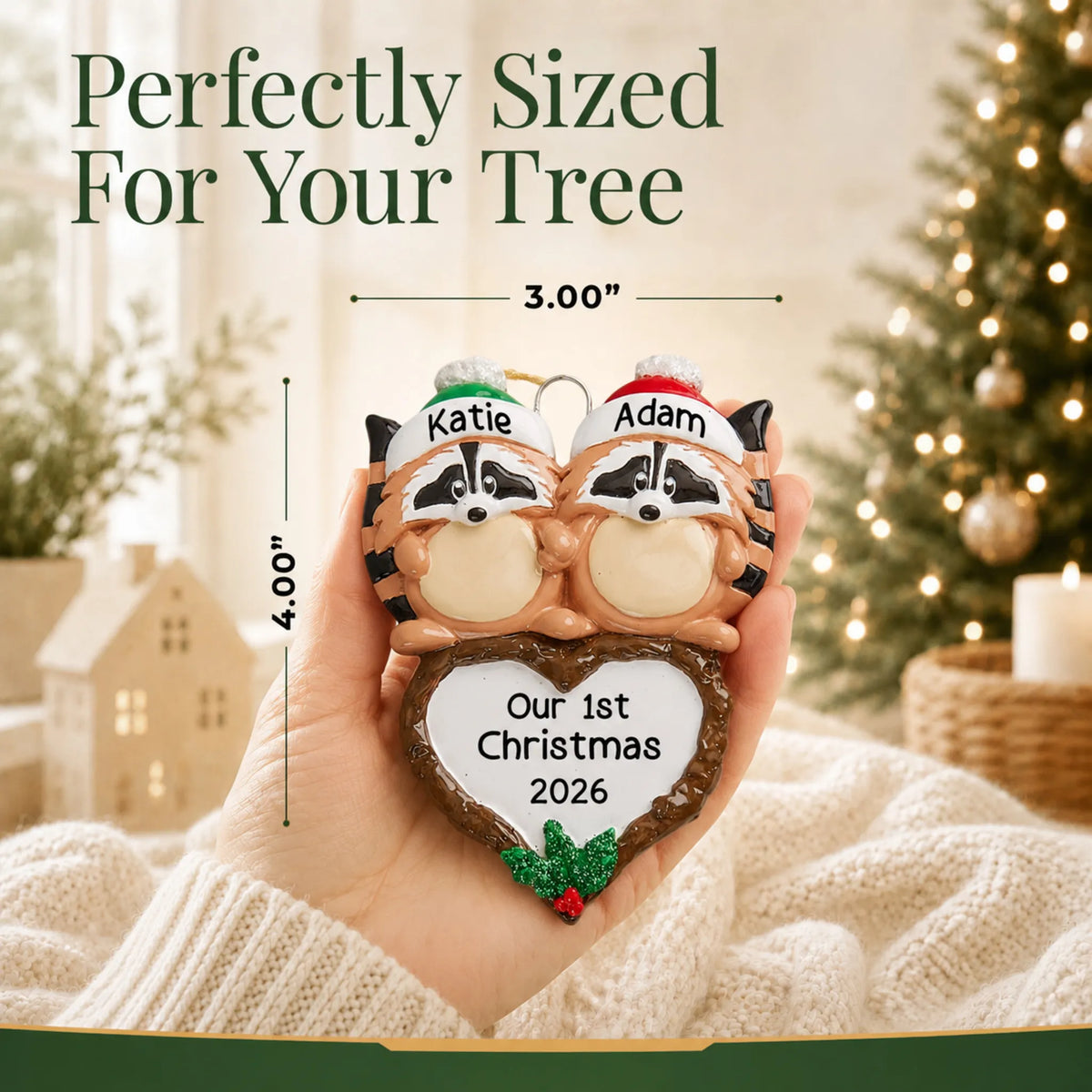 Size guide: the personalized raccoon couple christmas ornament is 3.00 in wide by 4.00 in tall, shown in hand