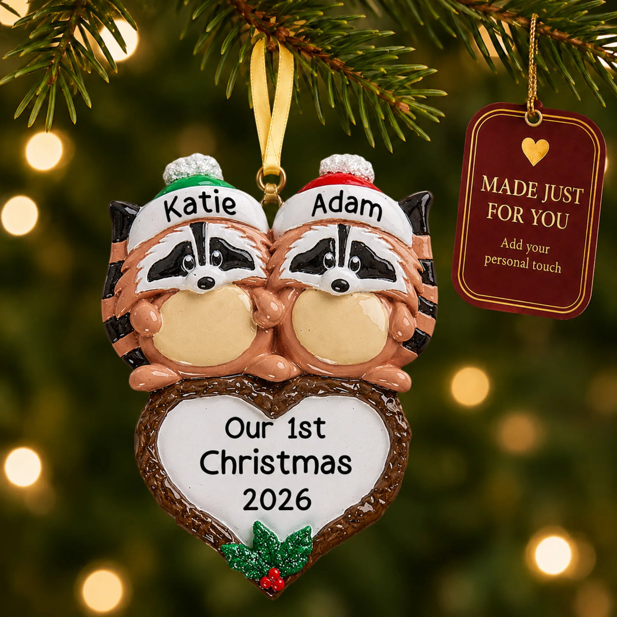 Raccoon couple christmas ornament hanging on a lit Christmas tree with a Made Just For You gift tag