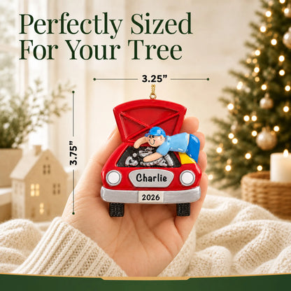 Size guide: the personalized mechanic christmas ornament is 3.25 in wide by 3.75 in tall, shown in hand