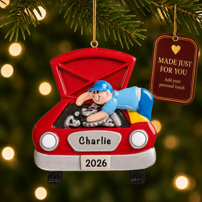 Mechanic christmas ornament hanging on a lit Christmas tree with a Made Just For You gift tag