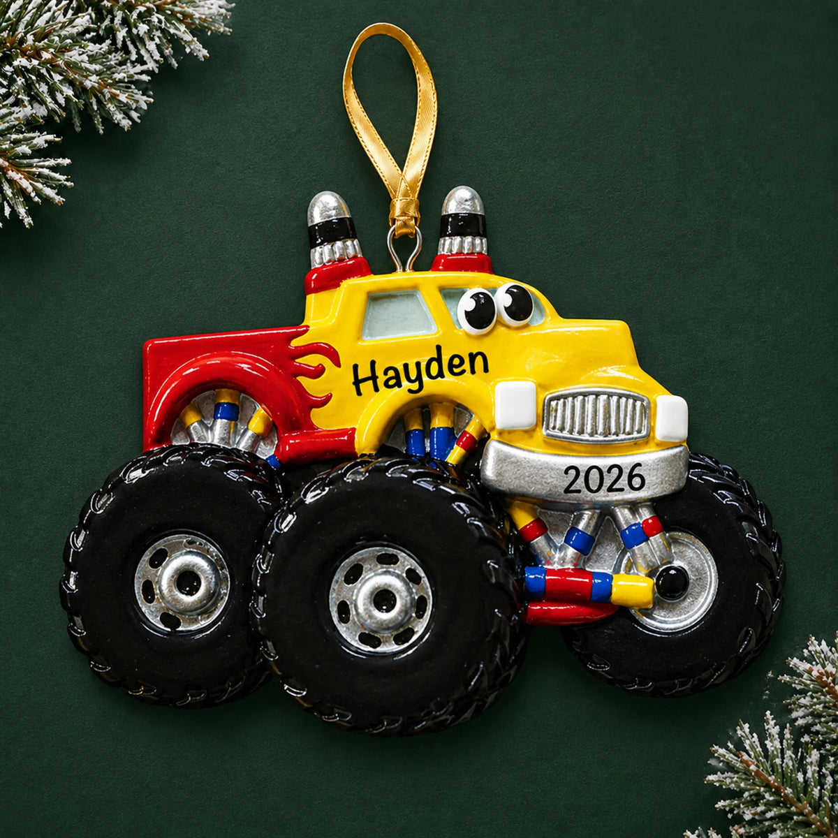 Personalized monster truck kids christmas ornament on a dark green pine background