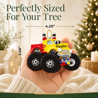 Size guide: the personalized monster truck kids christmas ornament shown in hand next to a Christmas tree