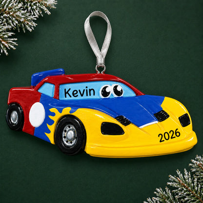 Personalized race car christmas ornament on a dark green pine background