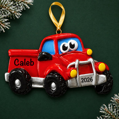 Personalized pickup truck christmas ornament on a dark green pine background