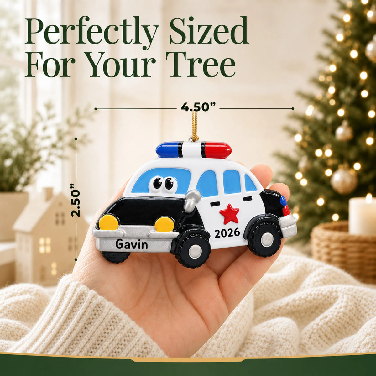 Size guide: the personalized police car christmas ornament shown in hand next to a Christmas tree