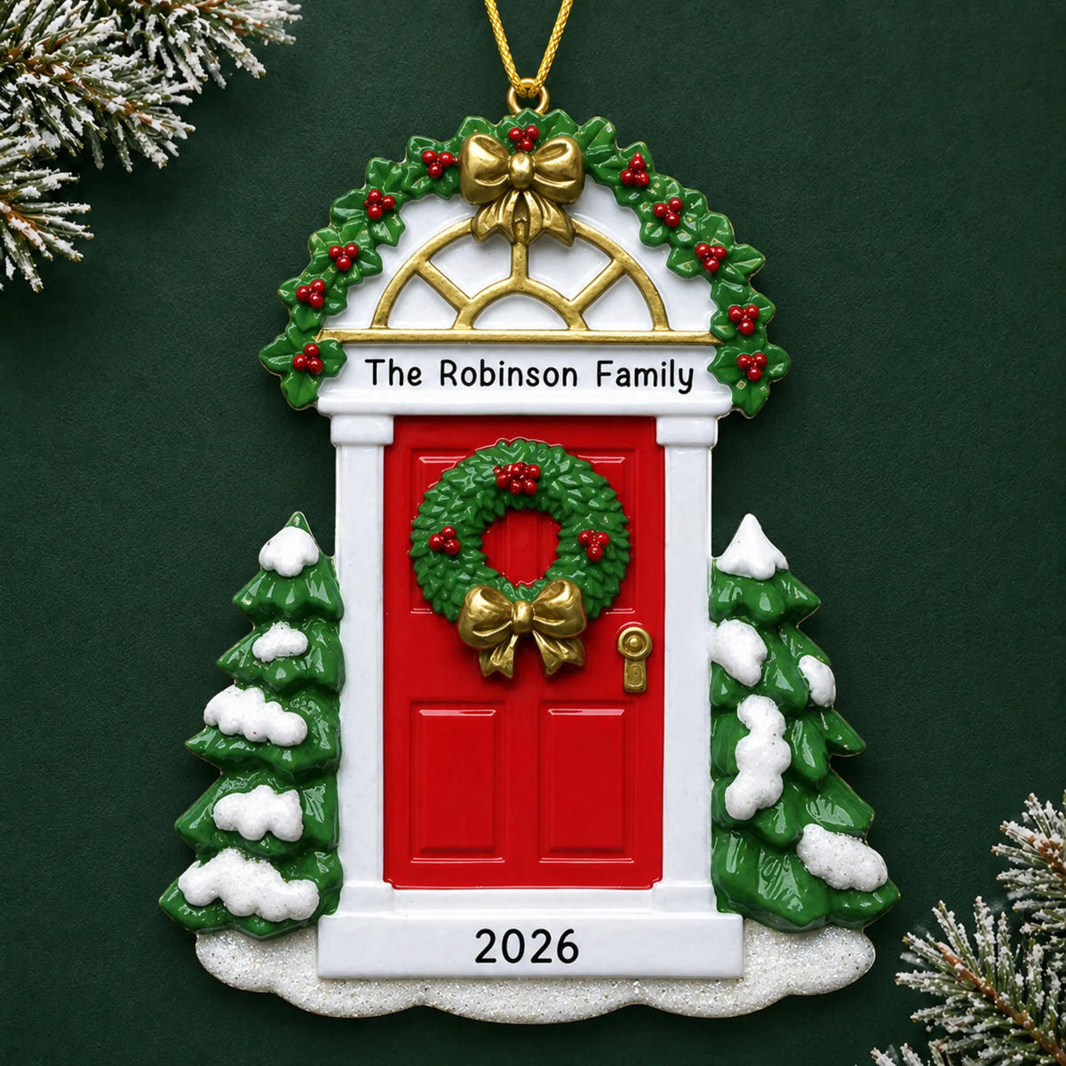 Personalized Red Door christmas ornament on a dark green pine background