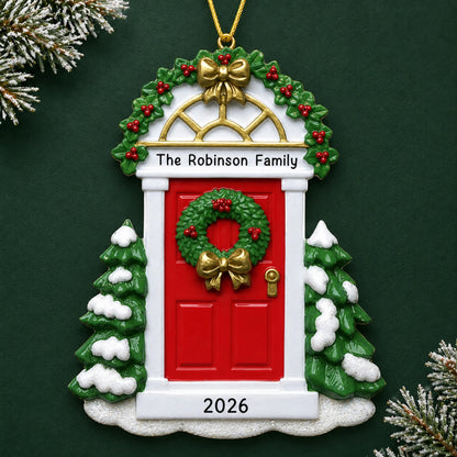 Personalized Red Door christmas ornament on a dark green pine background