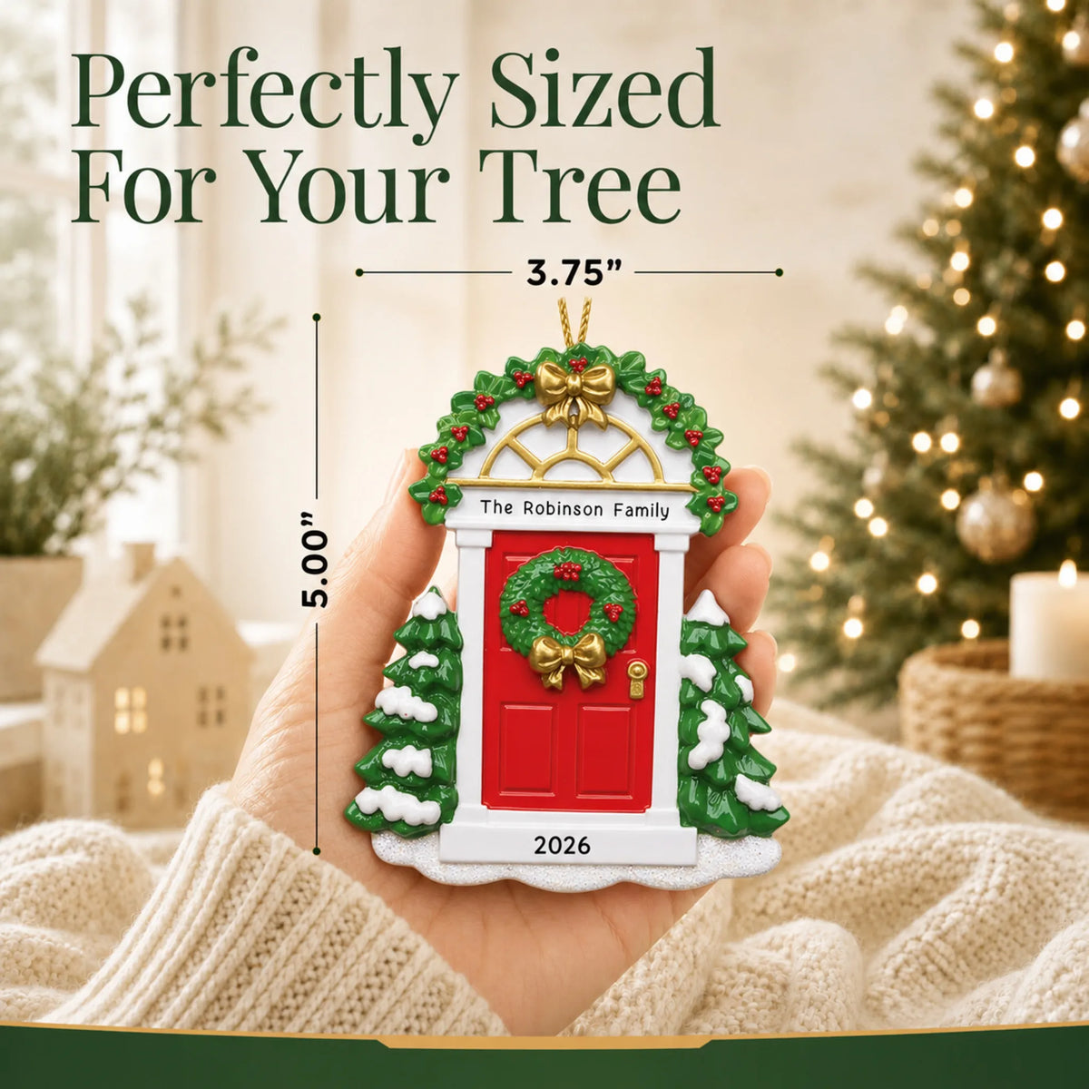 Size guide: the personalized Red Door christmas ornament is 3.75 in wide by 5.00 in tall, shown in hand