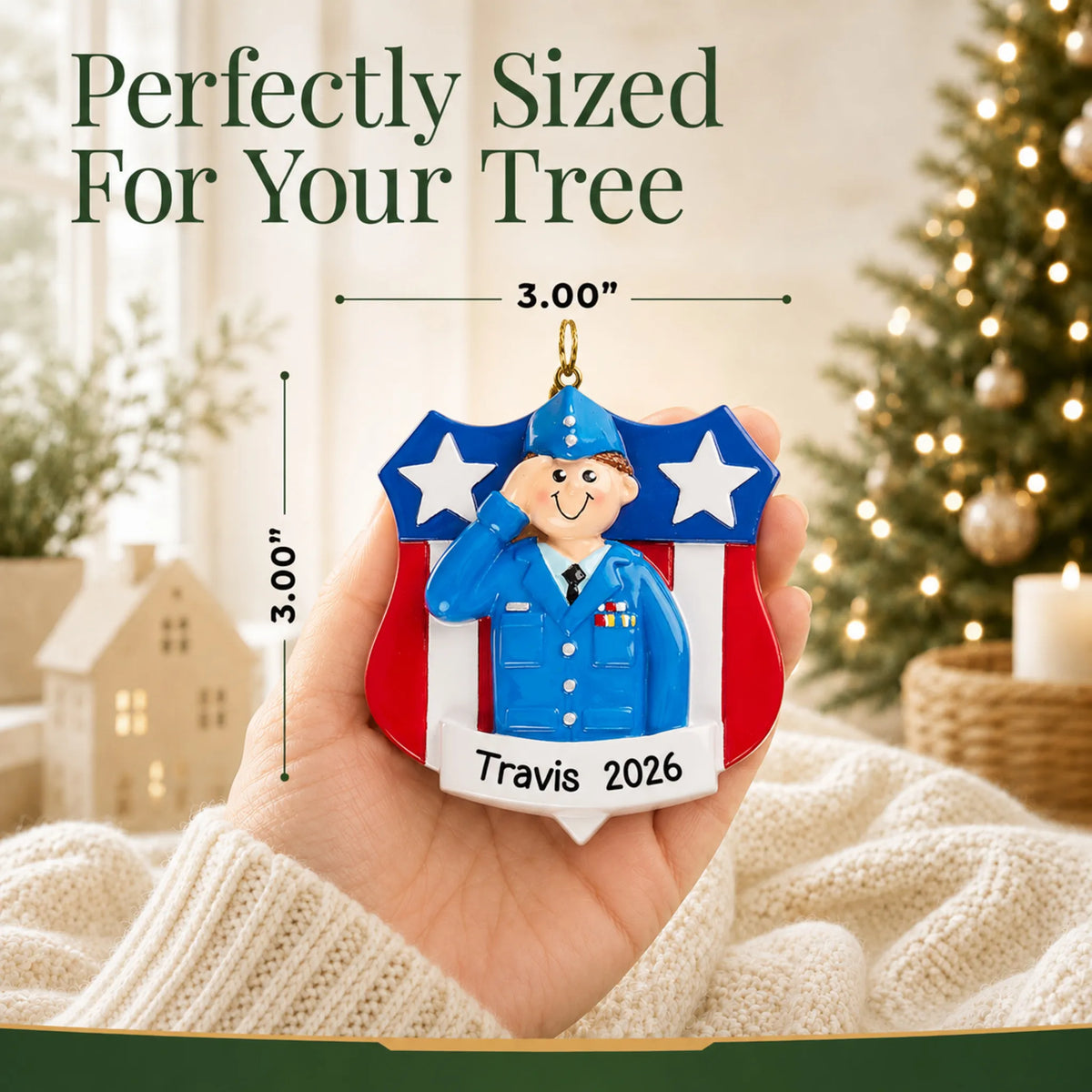 Personalized Air Force service member Christmas ornament held in hand to show its size on the tree