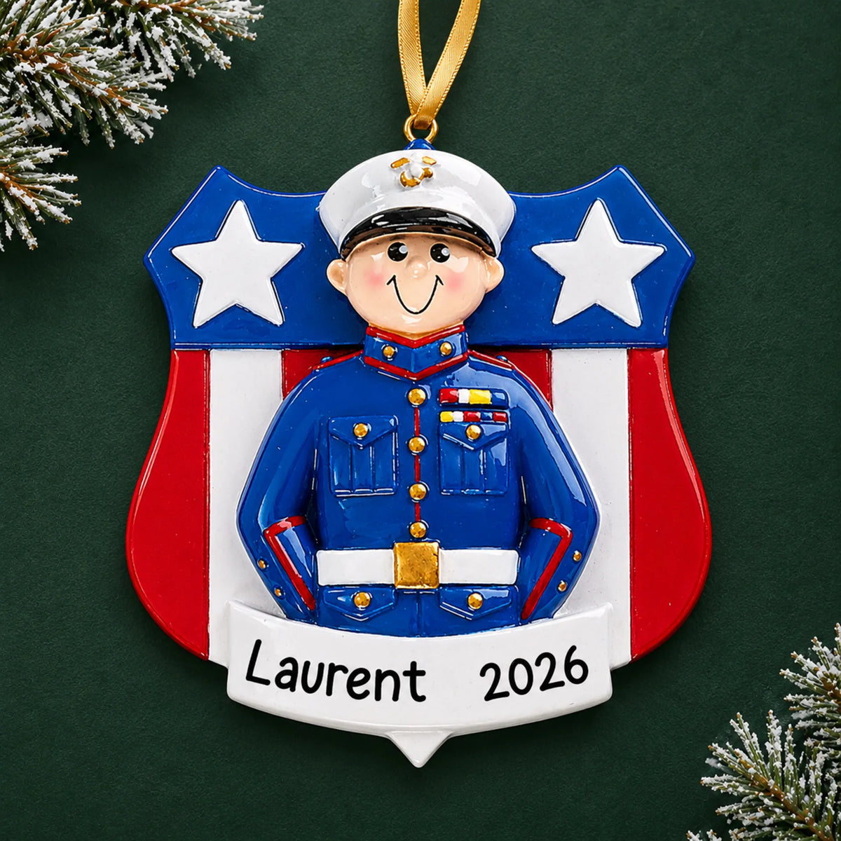 Personalized Marine Corps dress blues Christmas ornament with name and year, shown on a green holiday background