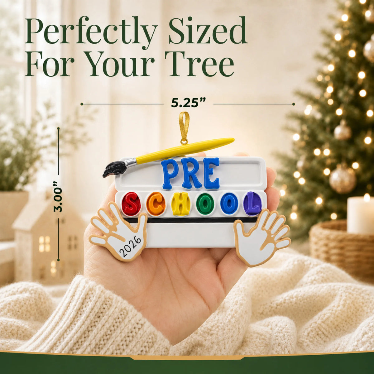 Personalized preschool Christmas ornament held in hand to show its size on the tree
