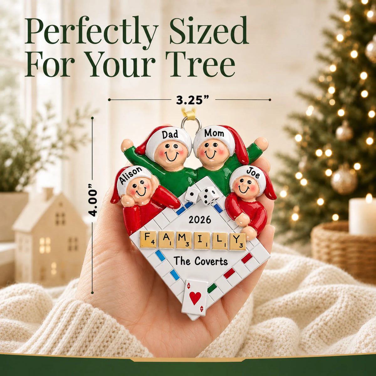Size guide: the personalized game night family of 4 christmas ornament is 3.25 in wide by 4.00 in tall, shown in hand