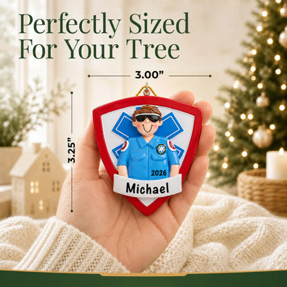 Size guide: the personalized EMT paramedic christmas ornament is 3.00 in wide by 3.25 in tall, shown in hand