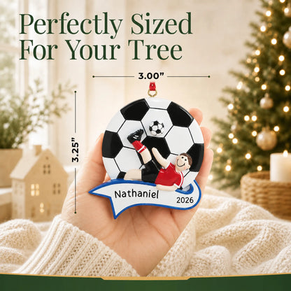 Size guide: the personalized soccer kick boy christmas ornament is 3.00 in wide by 3.25 in tall, shown in hand