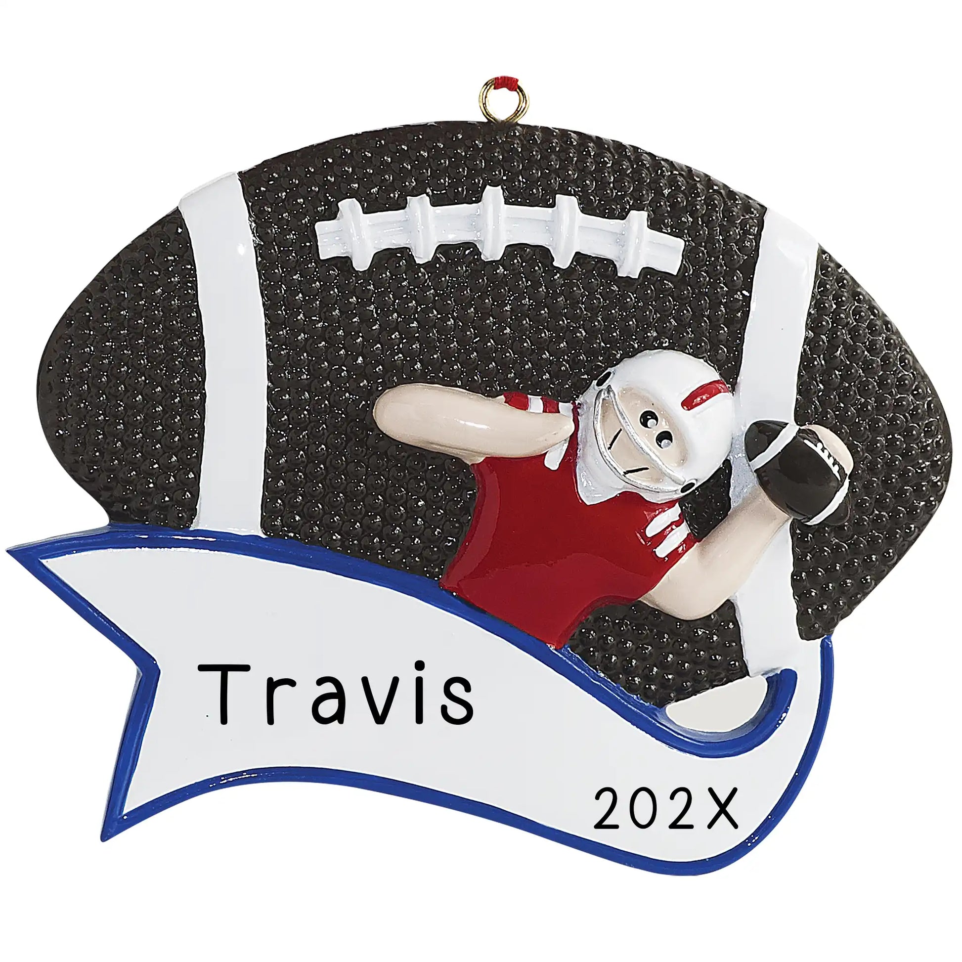 A personalized Christmas ornament featuring a football quarterback in a red jersey with a white helmet, holding a football. The name 'Travis' and the year '202x' are inscribed on the ornament.