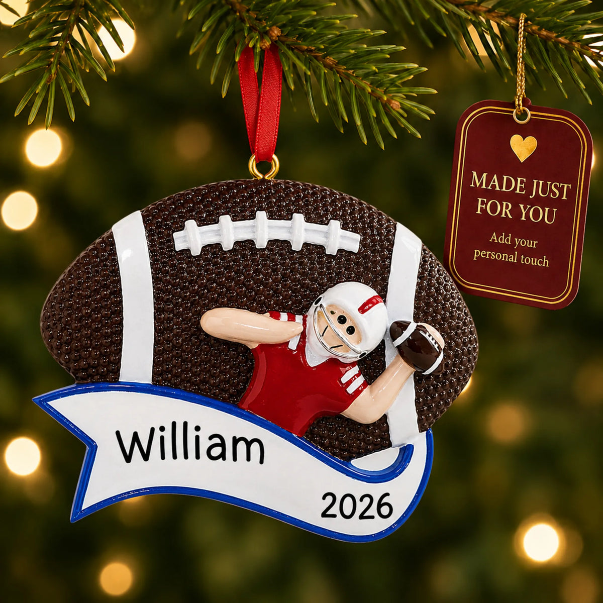 Football quarterback christmas ornament hanging on a lit Christmas tree with a Made Just For You gift tag