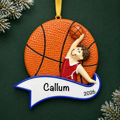 Personalized basketball dunk boy christmas ornament on a dark green pine background