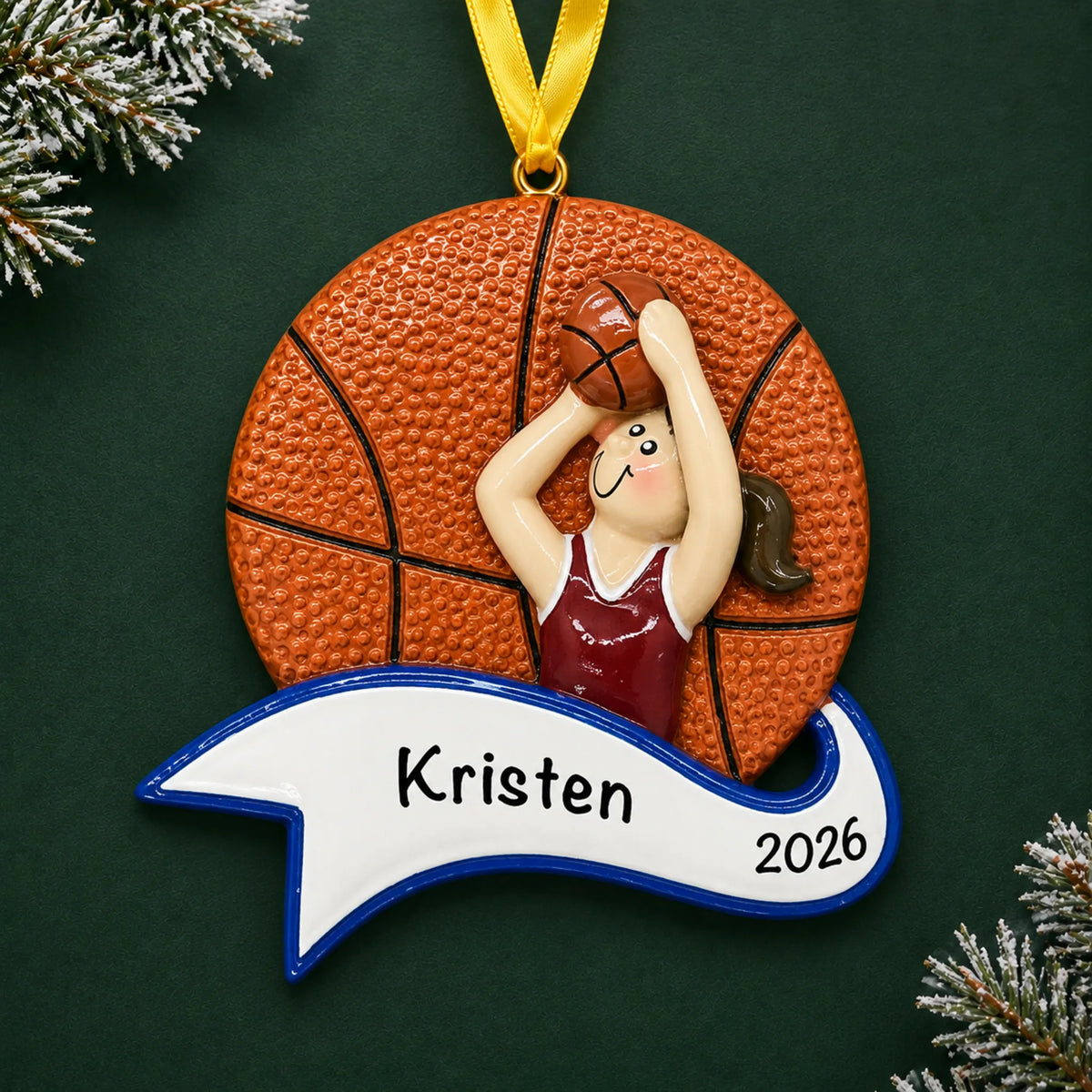 Personalized basketball shot girl christmas ornament on a dark green pine background