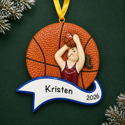 Personalized basketball shot girl christmas ornament on a dark green pine background