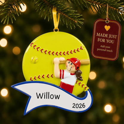 Softball batter girl christmas ornament hanging on a lit Christmas tree with a Made Just For You gift tag
