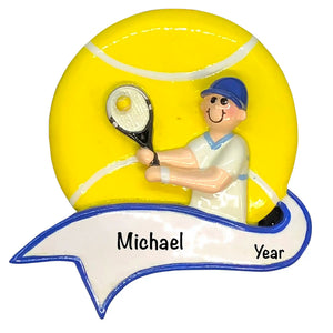 Personalized tennis boy Christmas ornament showing a boy mid-serve with a racket, engraved with a custom name and year.