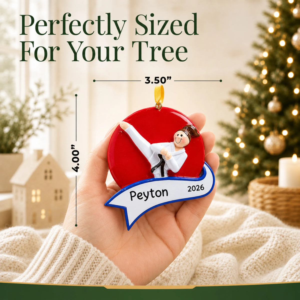 Size guide: the personalized karate kick girl christmas ornament is 3.50 in wide by 4.00 in tall, shown in hand