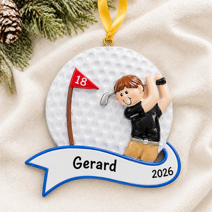 Personalized golfer swing guy christmas ornament laid on a soft white knit blanket