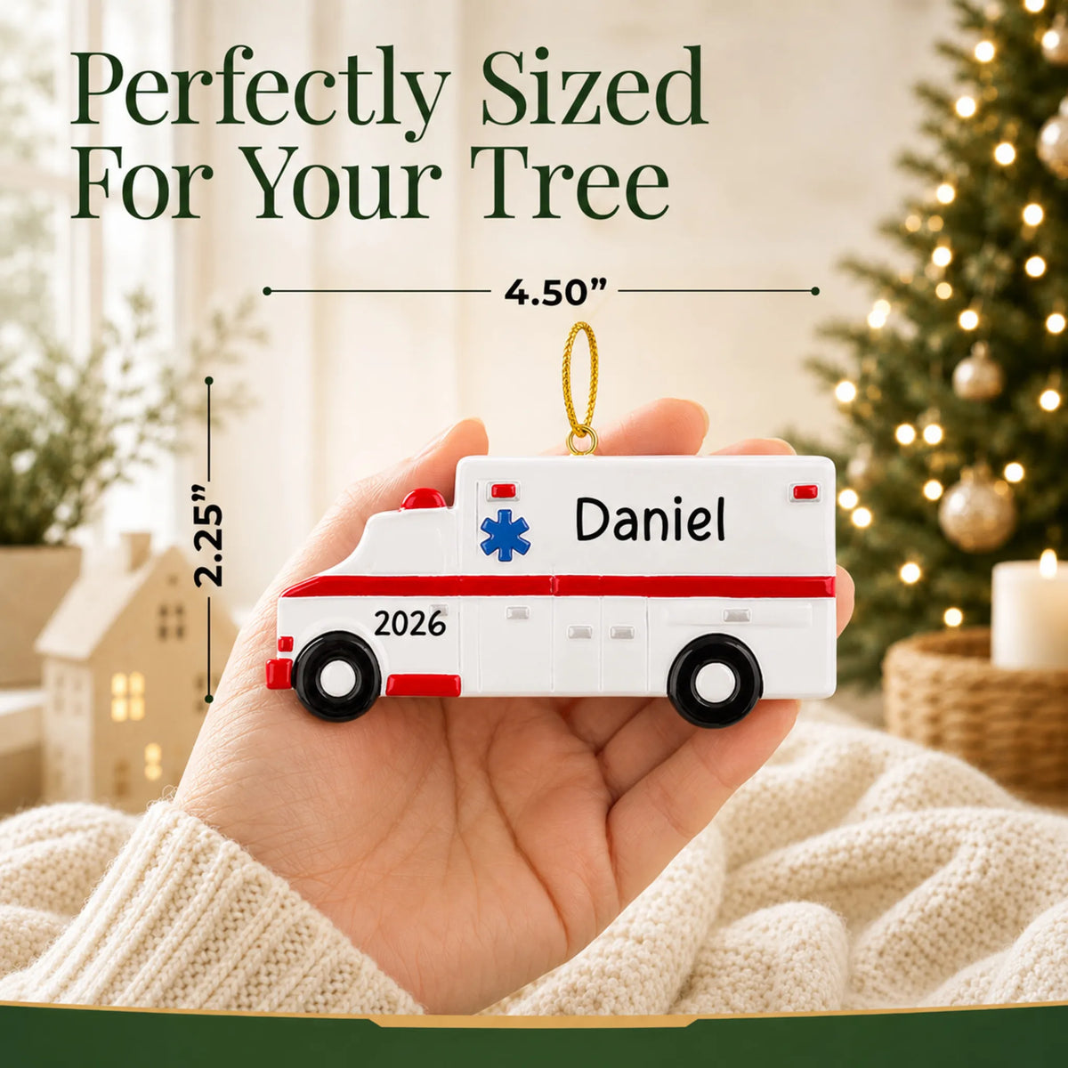 Size guide: the personalized ambulance christmas ornament is 4.50 in wide by 2.25 in tall, shown in hand