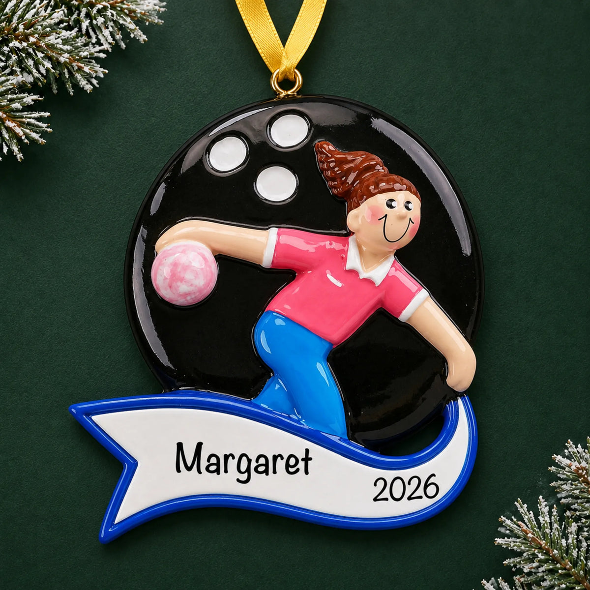 Personalized bowling girl christmas ornament on a dark green pine background