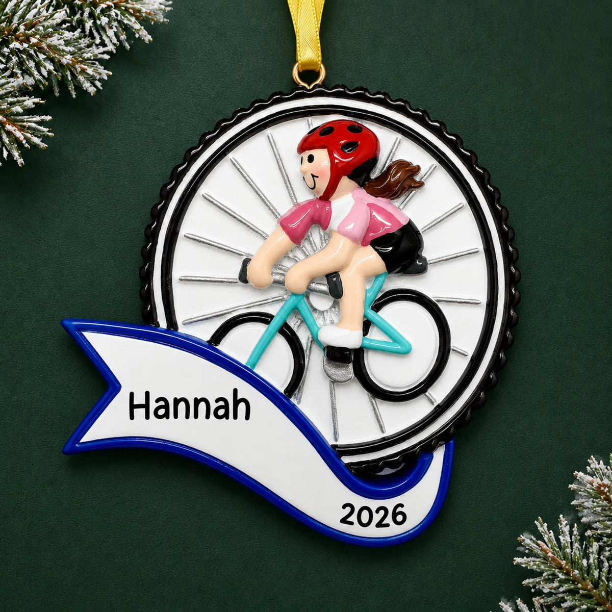 Personalized cycling girl christmas ornament on a dark green pine background