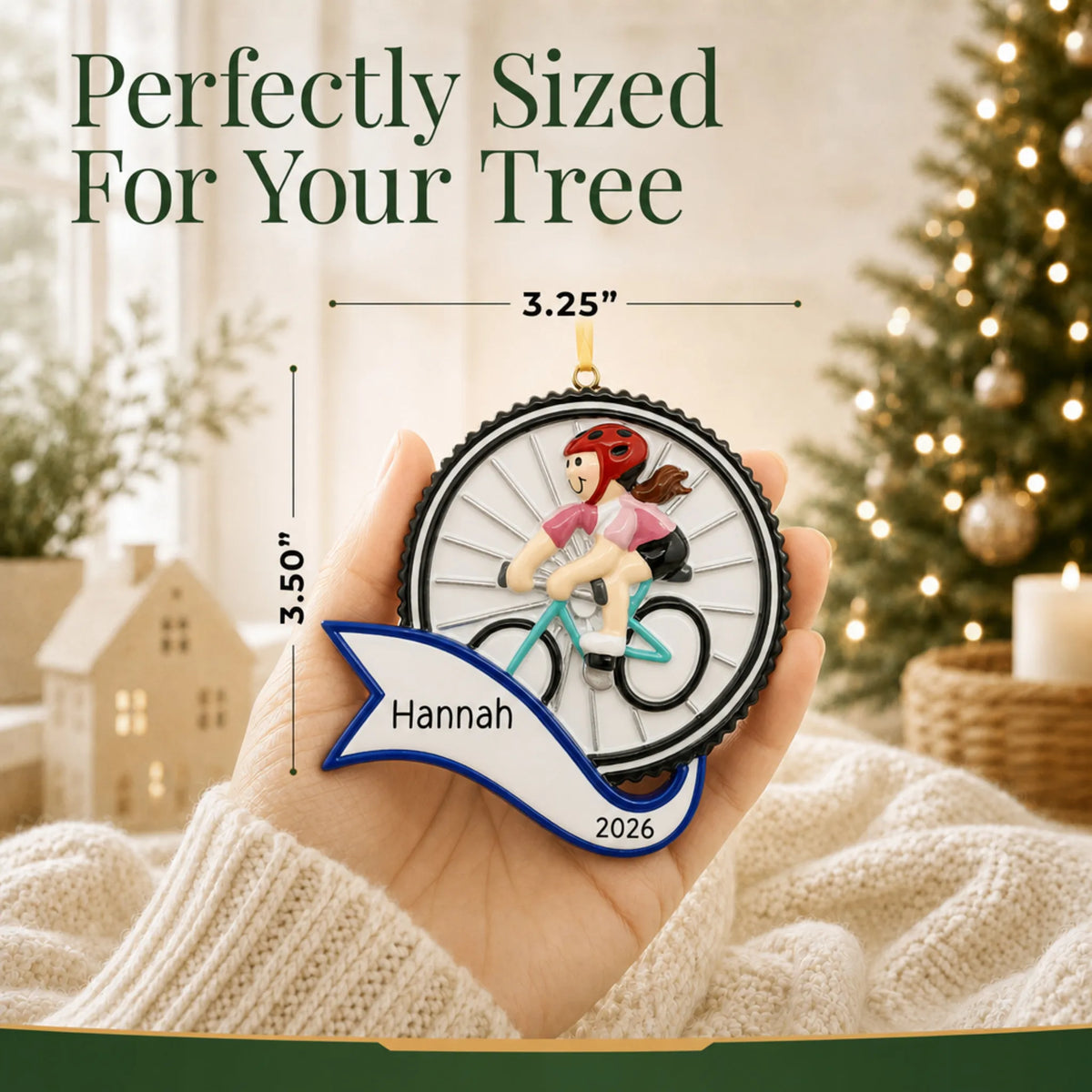 Size guide: the personalized cycling girl christmas ornament shown in hand next to a Christmas tree