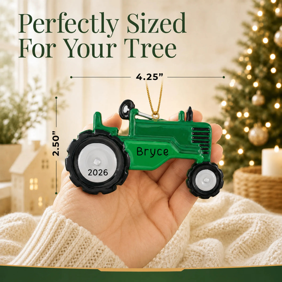 Size guide: the personalized green tractor christmas ornament is 4.25 in wide by 2.50 in tall, shown in hand