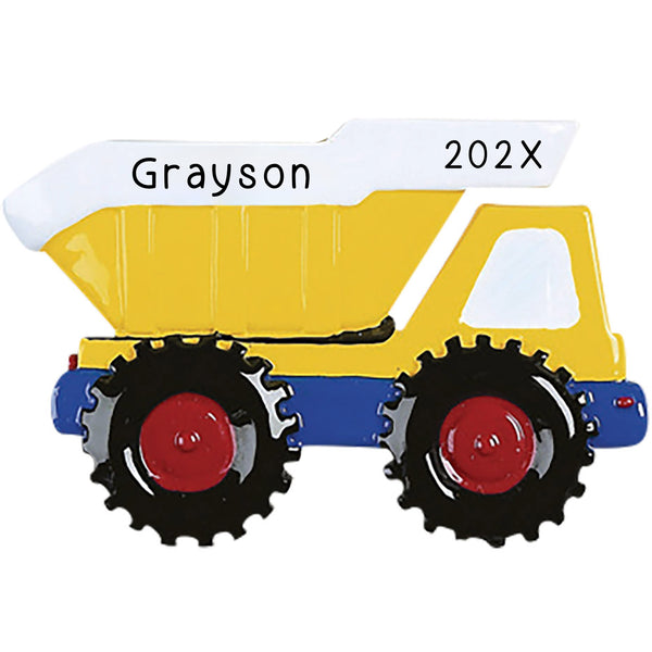 Personalized Christmas ornament shaped like a bright yellow and blue dump truck, with the name and the year engraved on the white truck bed.