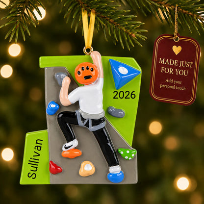 Rock climber guy christmas ornament hanging on a lit Christmas tree with a Made Just For You gift tag