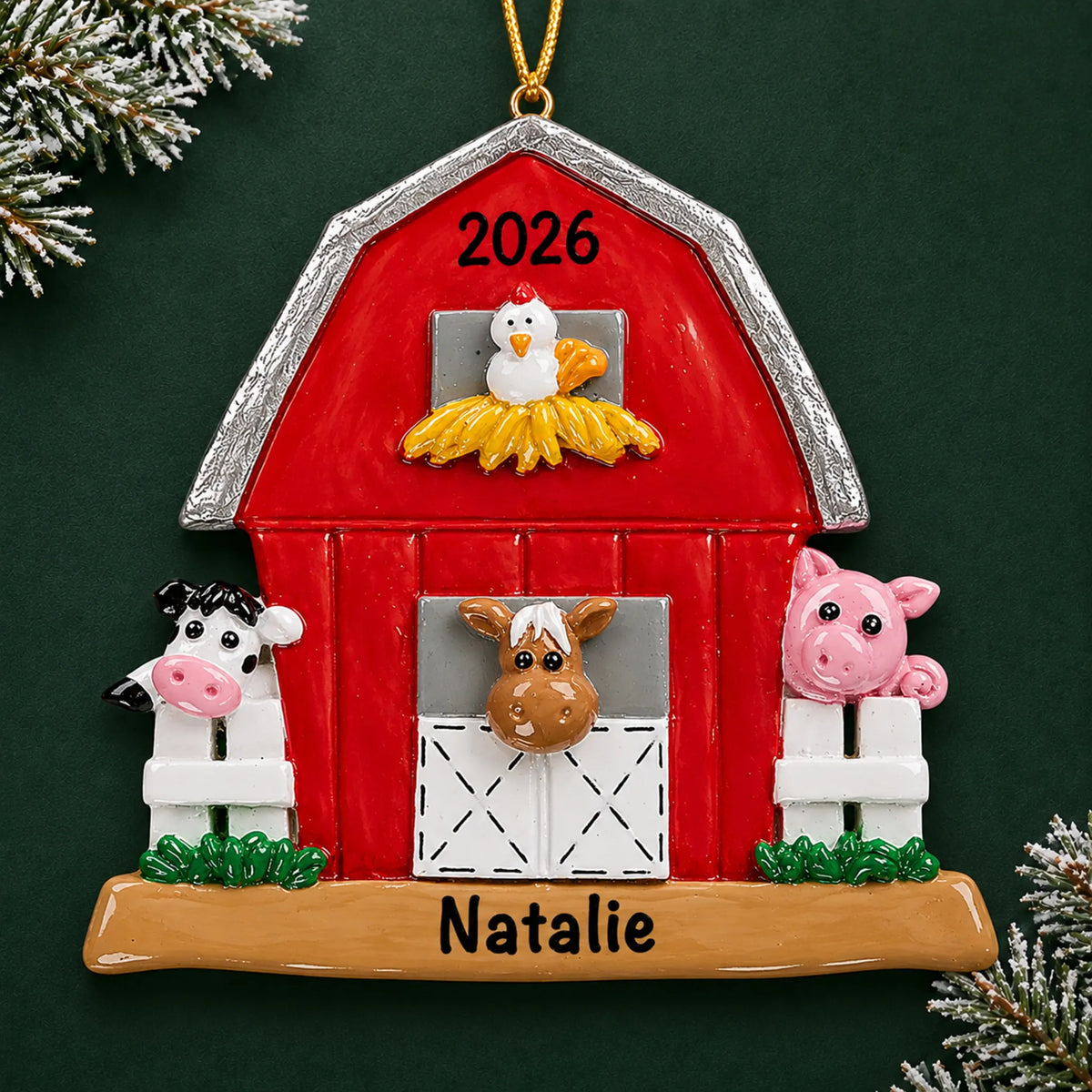 Personalized red barn farm animals christmas ornament on a dark green pine background